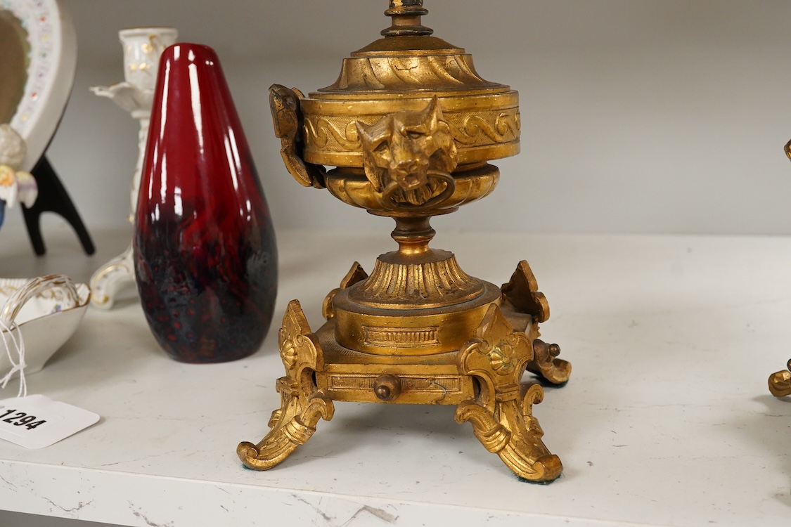 A pair of late 19th century French ormolu candlesticks, 37cm
